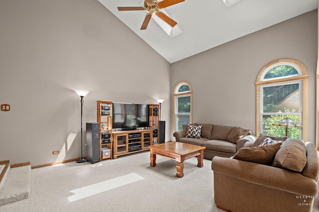 314 Spring Creek Cir, Schaumburg, IL 60173 - carpeted living room featuring high vaulted ceiling, a ceiling fan, and a skylight