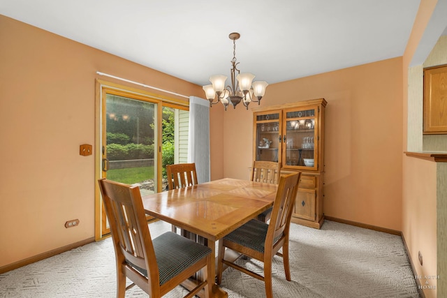 314 Spring Creek Cir, Schaumburg, IL 60173 - dining room with a chandelier and light carpet
