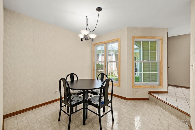 314 Spring Creek Cir, Schaumburg, IL 60173 - dining area with wallpapered walls and a chandelier