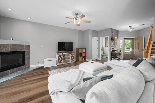 8033 Nielsen Dr, Tinley Park, IL 60477 - living room featuring stairs, wood finished floors, a fireplace, ceiling fan, and recessed lighting