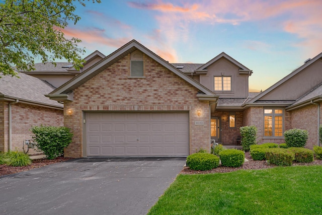 8033 Nielsen Dr, Tinley Park, IL 60477 - view of front of house with driveway, brick siding, an attached garage, and a front yard