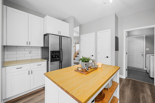 8033 Nielsen Dr, Tinley Park, IL 60477 - kitchen with stainless steel fridge, washing machine and clothes dryer, dark wood finished floors, white cabinets, and backsplash