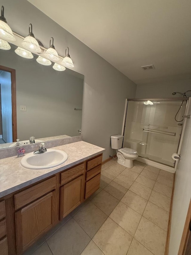 710 Silver Leaf Ct, Joliet, IL 60431 - full bathroom with a stall shower, vanity, and tile patterned floors