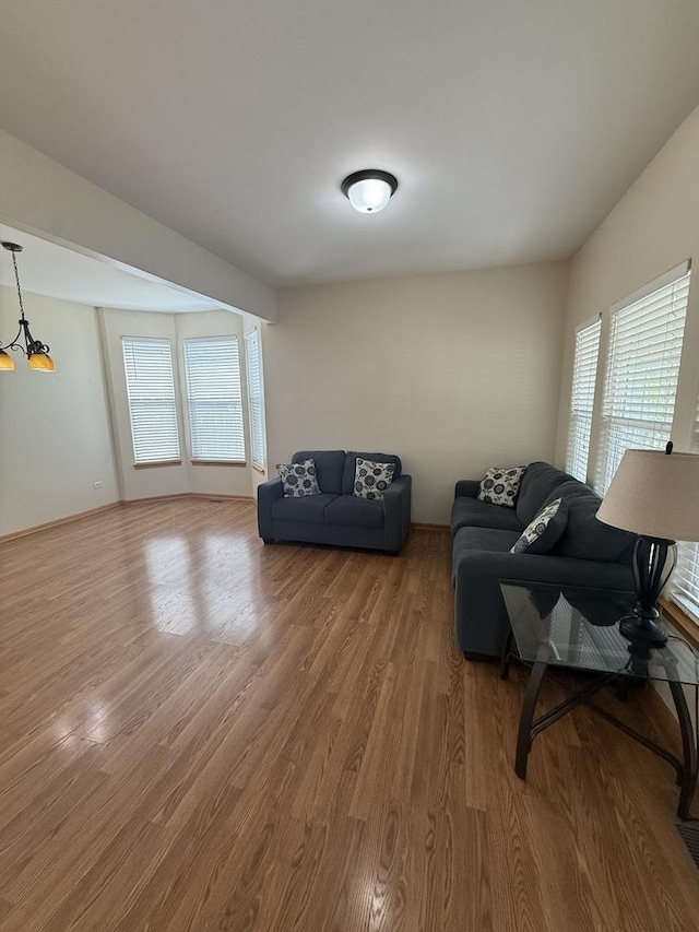 710 Silver Leaf Ct, Joliet, IL 60431 - living area featuring healthy amount of natural light and wood finished floors