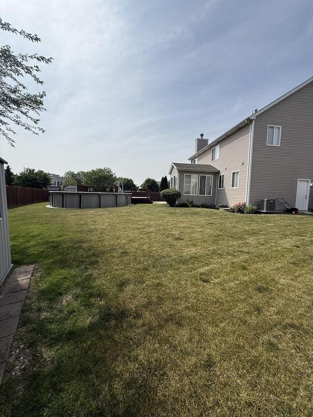710 Silver Leaf Ct, Joliet, IL 60431 - view of green lawn featuring an outdoor pool