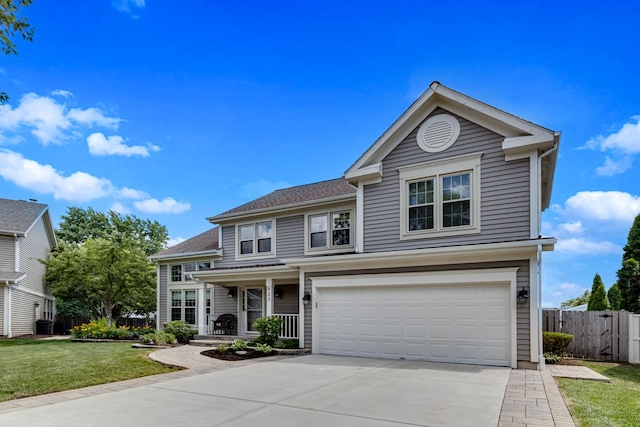 923 Christa Ct, Elk Grove Village, IL 60007 - traditional home with an attached garage, driveway, a porch, and a shingled roof