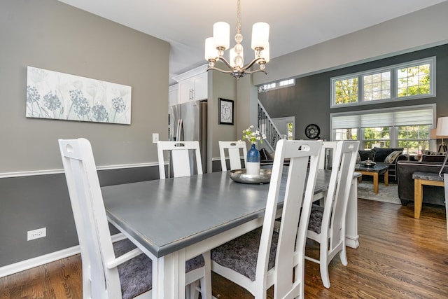 923 Christa Ct, Elk Grove Village, IL 60007 - dining room with dark wood-style flooring, a chandelier, and stairway