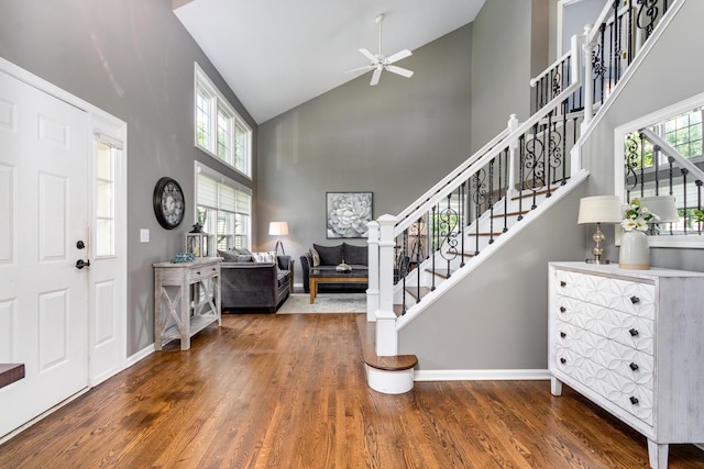 923 Christa Ct, Elk Grove Village, IL 60007 - entryway with high vaulted ceiling, wood finished floors, a ceiling fan, and stairway