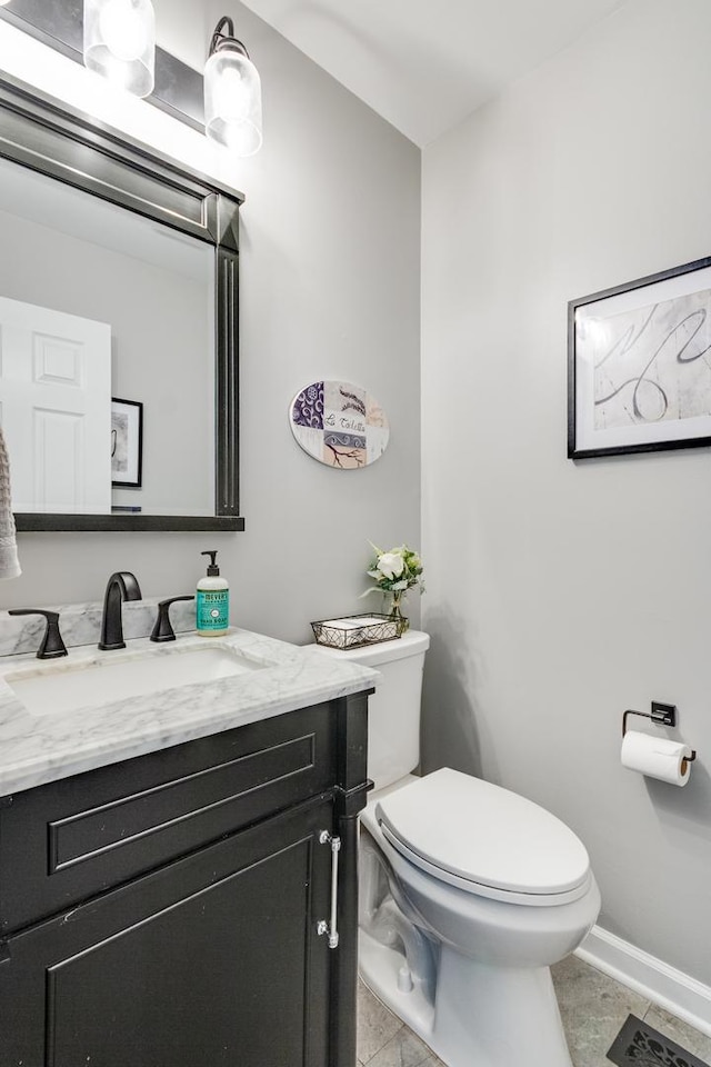 923 Christa Ct, Elk Grove Village, IL 60007 - half bath featuring vanity and tile patterned floors