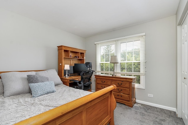923 Christa Ct, Elk Grove Village, IL 60007 - bedroom featuring light carpet, a desk, and a closet
