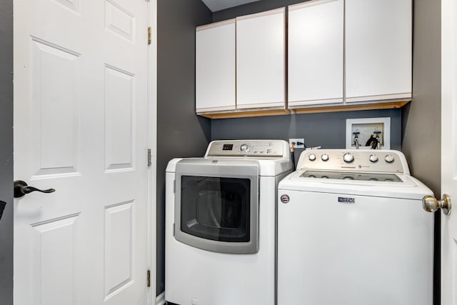 923 Christa Ct, Elk Grove Village, IL 60007 - laundry area featuring cabinet space and independent washer and dryer