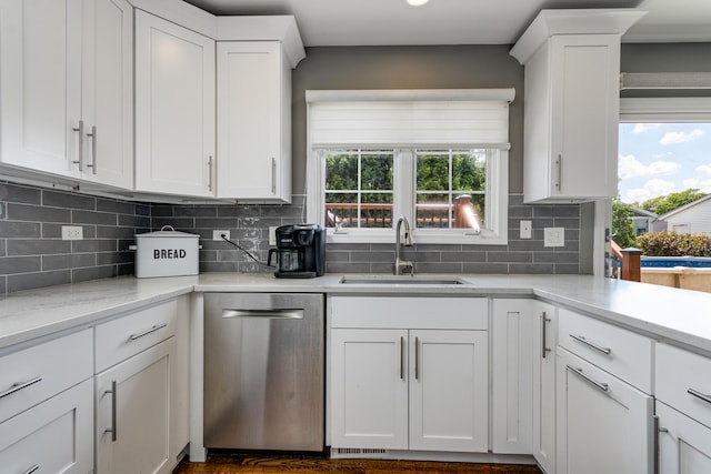 923 Christa Ct, Elk Grove Village, IL 60007 - kitchen featuring dishwasher, white cabinets, tasteful backsplash, and light stone countertops
