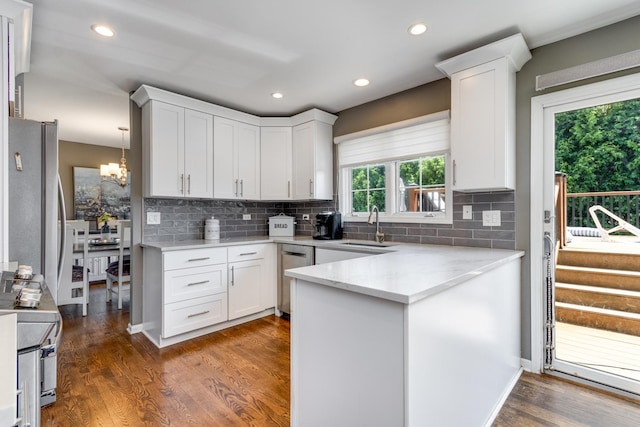 923 Christa Ct, Elk Grove Village, IL 60007 - kitchen with stainless steel appliances, tasteful backsplash, white cabinets, and recessed lighting