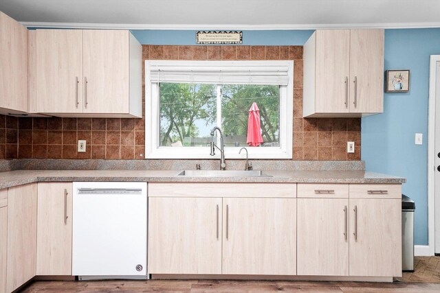 9111 Memory Trl, Wonder Lake, IL 60097 - kitchen with white dishwasher, light brown cabinets, light countertops, tasteful backsplash, and light wood-style floors