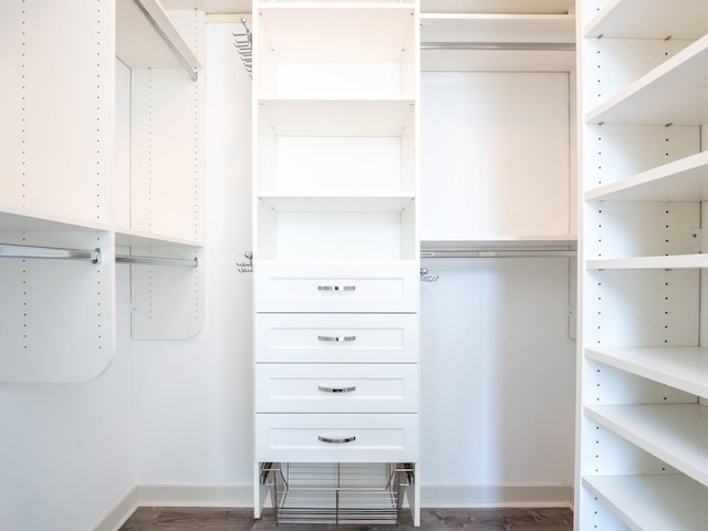 653 N Kingsbury St Unit 1707, Chicago, IL 60654 - spacious closet featuring dark wood-type flooring