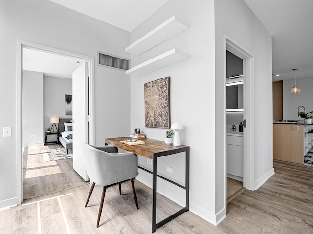 653 N Kingsbury St Unit 1707, Chicago, IL 60654 - office space featuring wood finished floors and baseboards