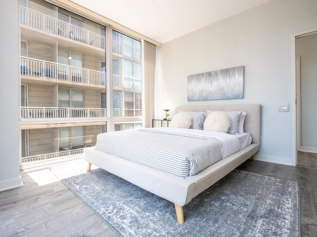 653 N Kingsbury St Unit 1707, Chicago, IL 60654 - bedroom featuring wood finished floors