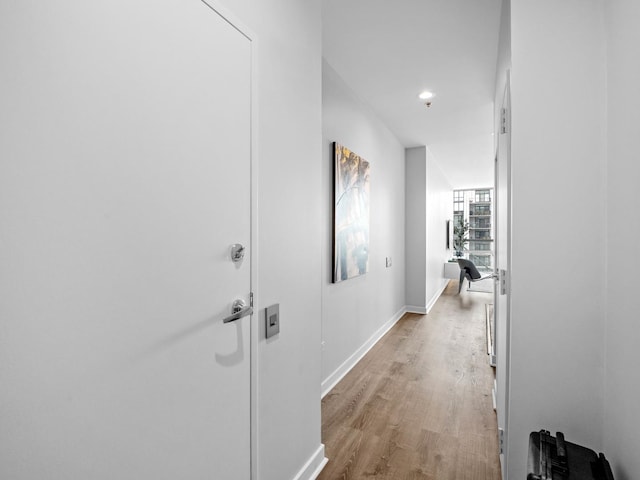 653 N Kingsbury St Unit 1707, Chicago, IL 60654 - hall featuring light wood-style flooring and baseboards