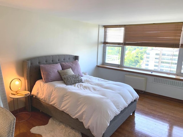 4250 N Marine Dr Unit 1404, Chicago, IL 60613 - bedroom with hardwood / wood-style flooring and radiator