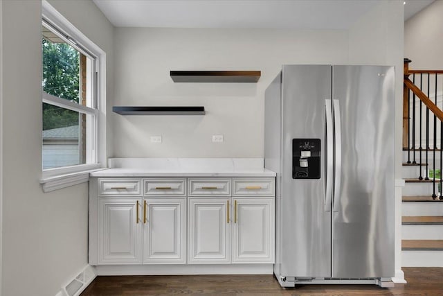 3935 W Jarvis Ave, Lincolnwood, IL 60712 - kitchen featuring stainless steel fridge with ice dispenser, open shelves, white cabinets, and dark wood-style floors