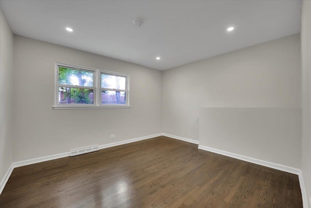 3935 W Jarvis Ave, Lincolnwood, IL 60712 - unfurnished room with dark wood-style floors, recessed lighting, and a smoke detector