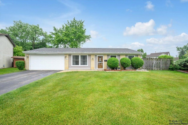 8246 N Applewood Ct, Hanover Park, IL 60133 - ranch-style house featuring driveway and an attached garage