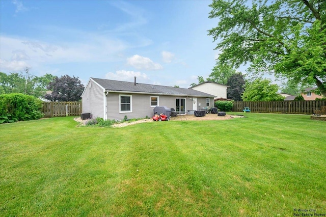 8246 N Applewood Ct, Hanover Park, IL 60133 - rear view of house with a fenced backyard and a patio area