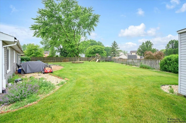 8246 N Applewood Ct, Hanover Park, IL 60133 - fenced backyard with a playground