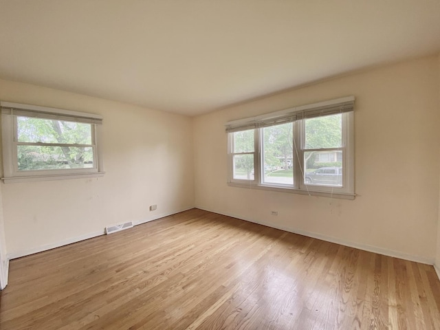 234 Tahoe Dr, Chicago Heights, IL 60411 - unfurnished room with wood finished floors and baseboards