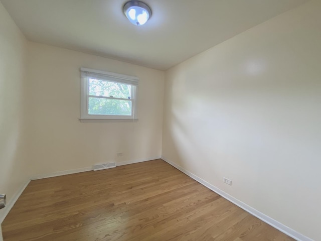 234 Tahoe Dr, Chicago Heights, IL 60411 - unfurnished room featuring light wood-type flooring and baseboards