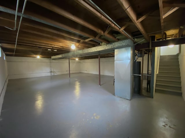 234 Tahoe Dr, Chicago Heights, IL 60411 - unfinished below grade area featuring stairway and heating unit