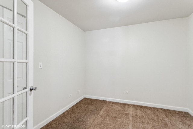 6427 N Damen Ave Unit 1E, Chicago, IL 60645 - carpeted spare room featuring baseboards