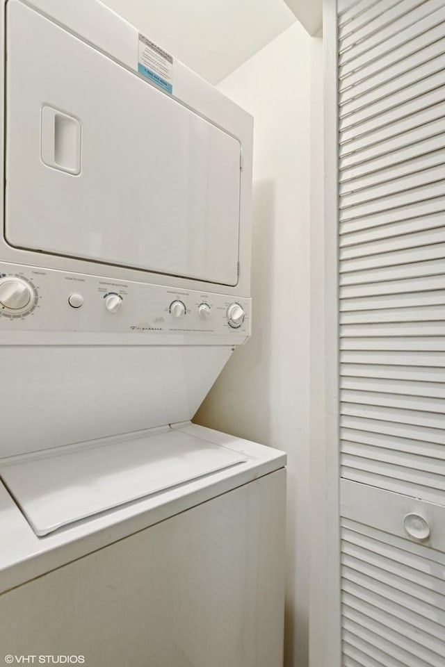 6427 N Damen Ave Unit 1E, Chicago, IL 60645 - washroom with stacked washer / drying machine