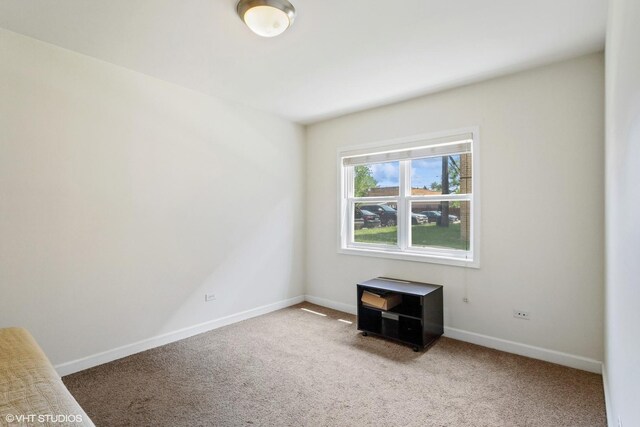 6427 N Damen Ave Unit 1E, Chicago, IL 60645 - spare room with light colored carpet