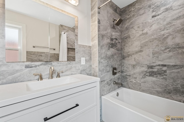 8207 S Laflin St, Chicago, IL 60620 - full bathroom with shower / tub combo, vanity, and tile walls