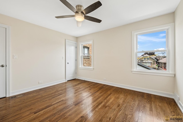 8207 S Laflin St, Chicago, IL 60620 - empty room featuring a ceiling fan and wood finished floors