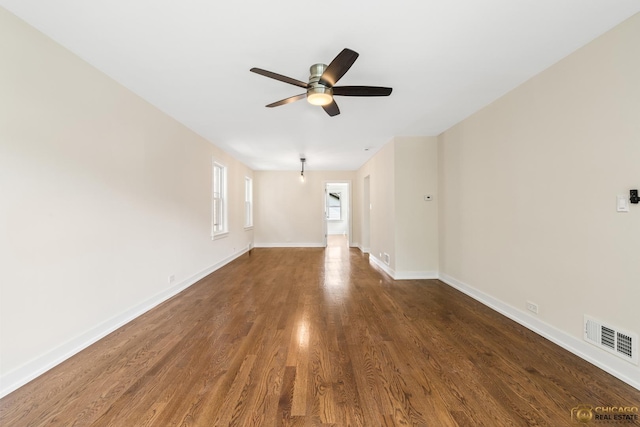 8207 S Laflin St, Chicago, IL 60620 - empty room with a ceiling fan and wood finished floors