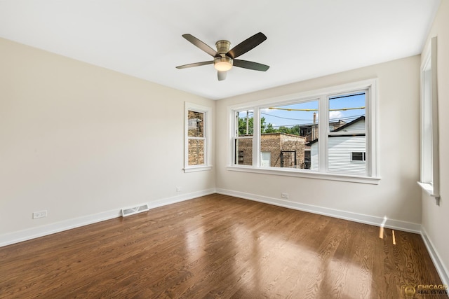 8207 S Laflin St, Chicago, IL 60620 - spare room with wood finished floors and ceiling fan