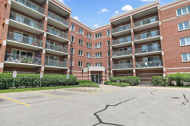4210 N Natchez Ave Unit 208, Chicago, IL 60634 - view of apartment building / complex with uncovered parking