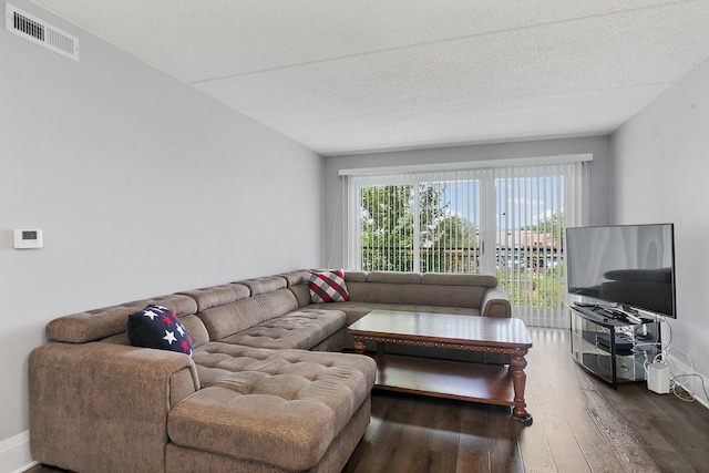 4210 N Natchez Ave Unit 208, Chicago, IL 60634 - living area with wood finished floors and a textured ceiling