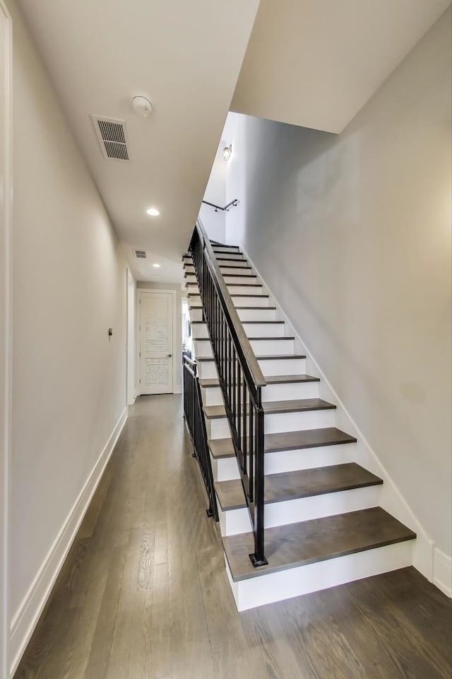 2131 W Huron St, Chicago, IL 60612 - stairway featuring wood finished floors and recessed lighting
