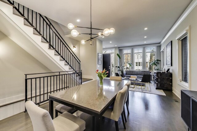 2131 W Huron St, Chicago, IL 60612 - dining room with wood finished floors, a chandelier, recessed lighting, and stairs