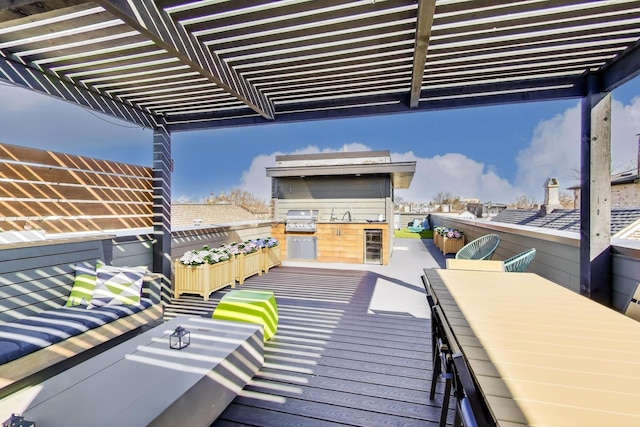 2131 W Huron St, Chicago, IL 60612 - balcony featuring an outdoor kitchen, outdoor dining space, a pergola, and beverage cooler