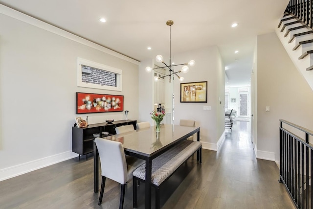 2131 W Huron St, Chicago, IL 60612 - dining area featuring dark wood-style flooring, a chandelier, recessed lighting, and stairway