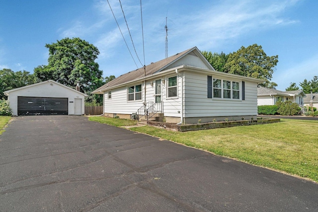 215 W Southmor Rd, Morris, IL 60450 - view of front of property with an outdoor structure, a detached garage, and a front lawn