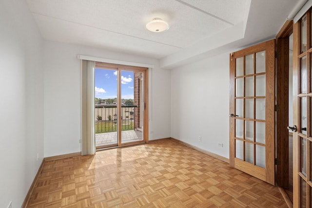 8540 W Foster Ave Unit 505, Norridge, IL 60706 - unfurnished room featuring french doors and a textured ceiling