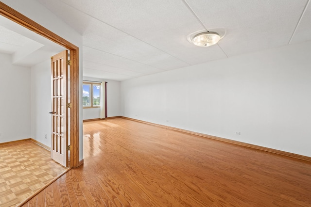 8540 W Foster Ave Unit 505, Norridge, IL 60706 - unfurnished room with light wood finished floors and baseboards
