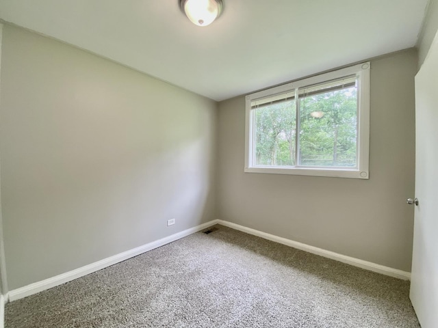 456 Tomahawk St, Park Forest, IL 60466 - carpeted spare room featuring baseboards