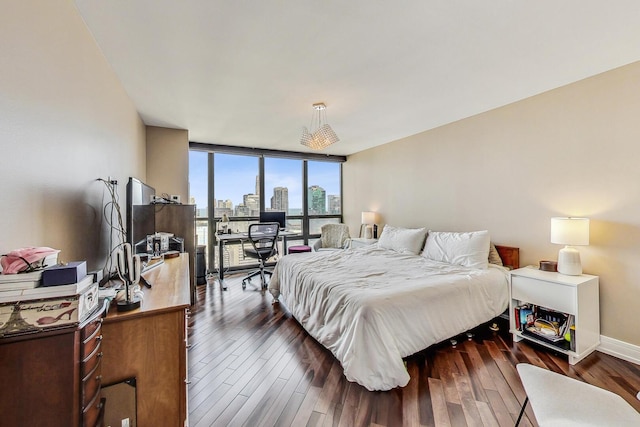 10 E Ontario St Unit 4808, Chicago, IL 60611 - bedroom with dark wood-style flooring and a wall of windows