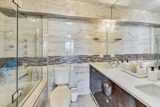 10 E Ontario St Unit 4808, Chicago, IL 60611 - full bath featuring double vanity, marble tiled flooring, enclosed tub / shower combo, and tile walls